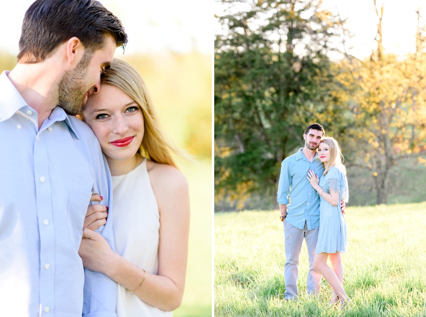 girl smiling at the camera while fiance nuzzles in her hair