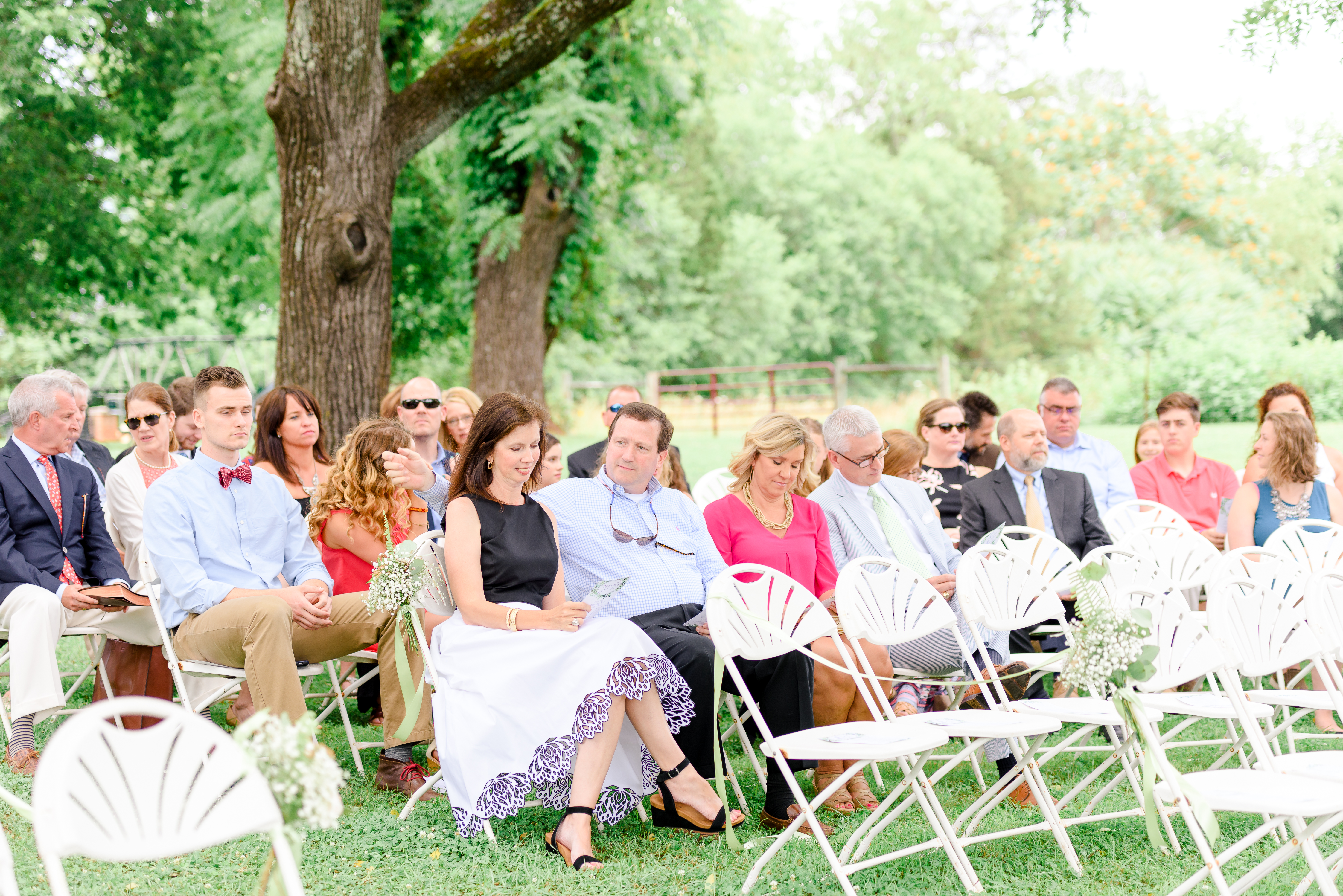 wedding guests during outdoor ceremony