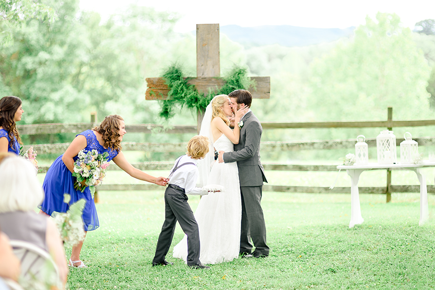 ring bearer during bride and groom first kiss