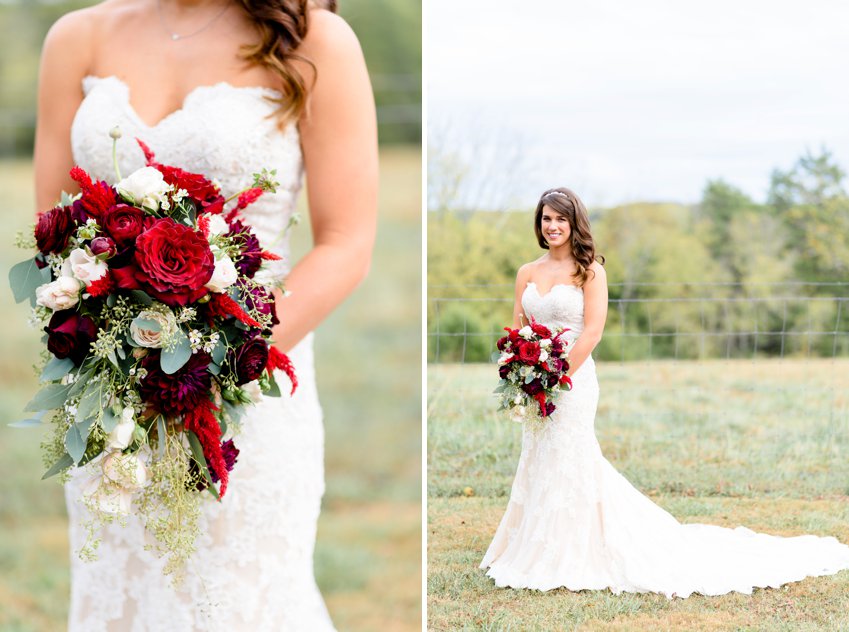 beautiful bride holding her red wedding bouquet