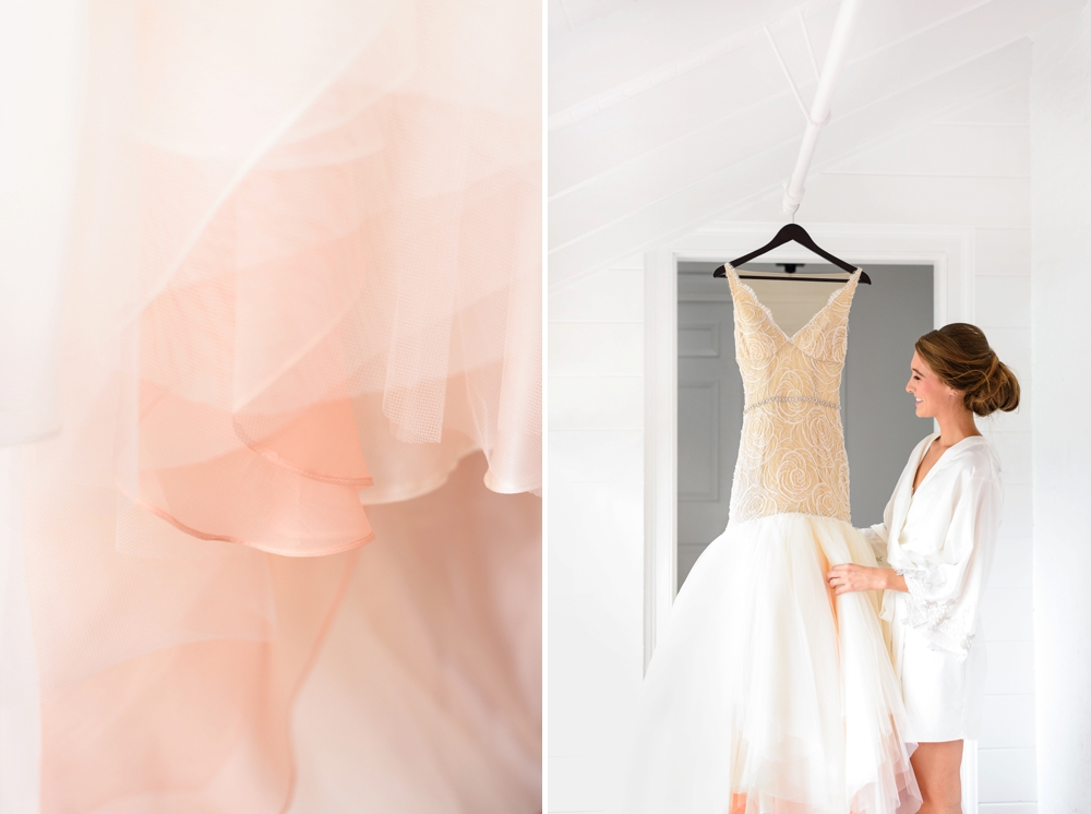 bride looking at her wedding dress