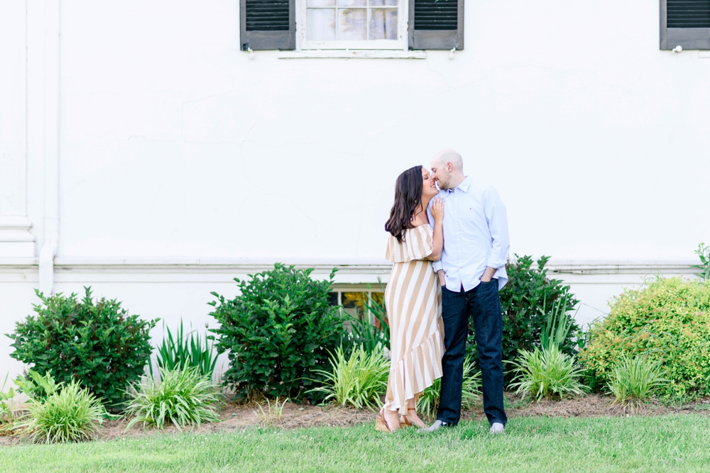 sweethearts kissing during engagement photos in berryville, virginia