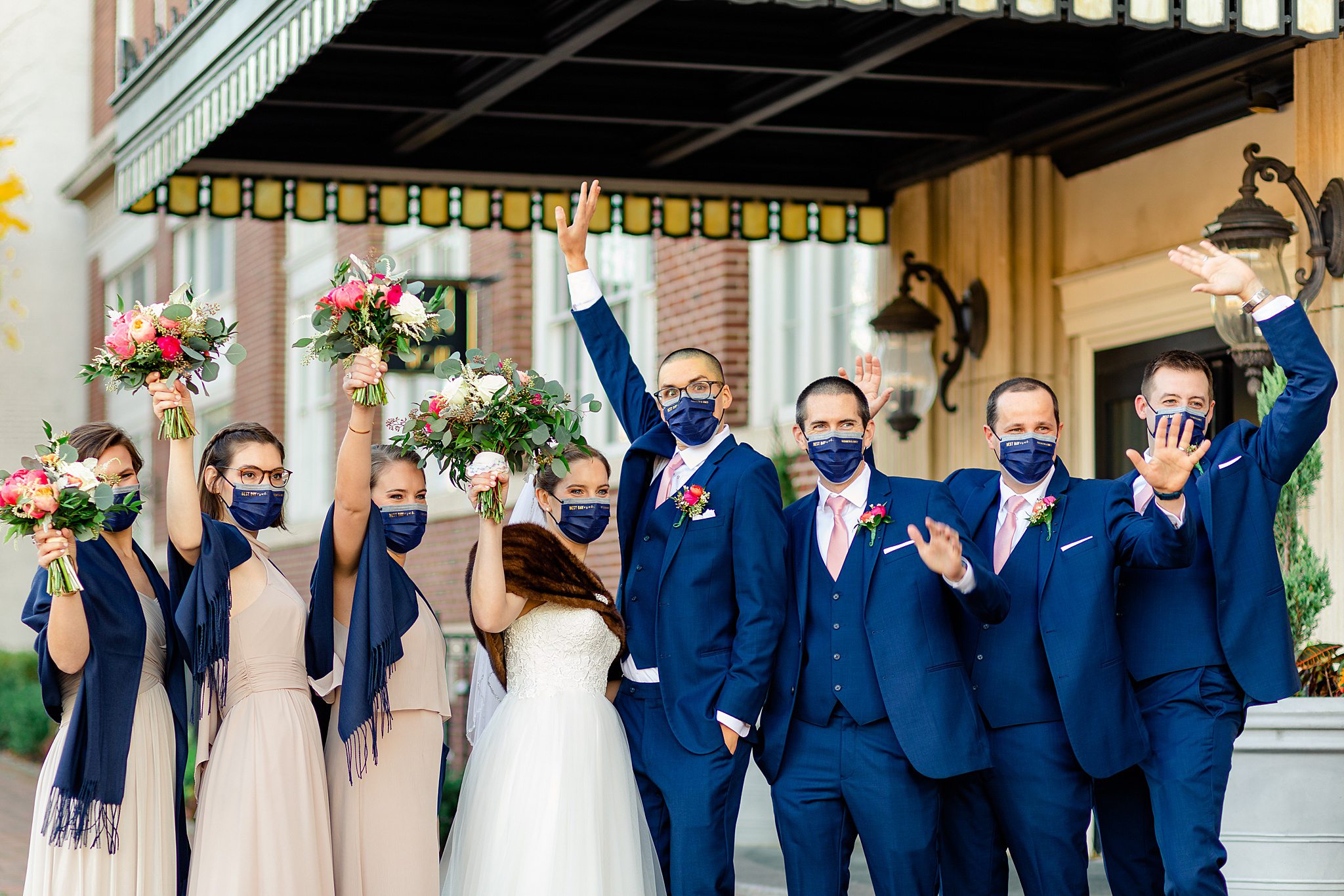 bridal party wearing masks for pictures