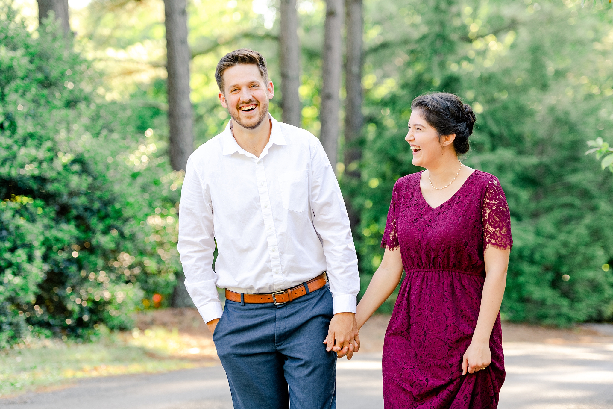couple walking and smiling for pictures