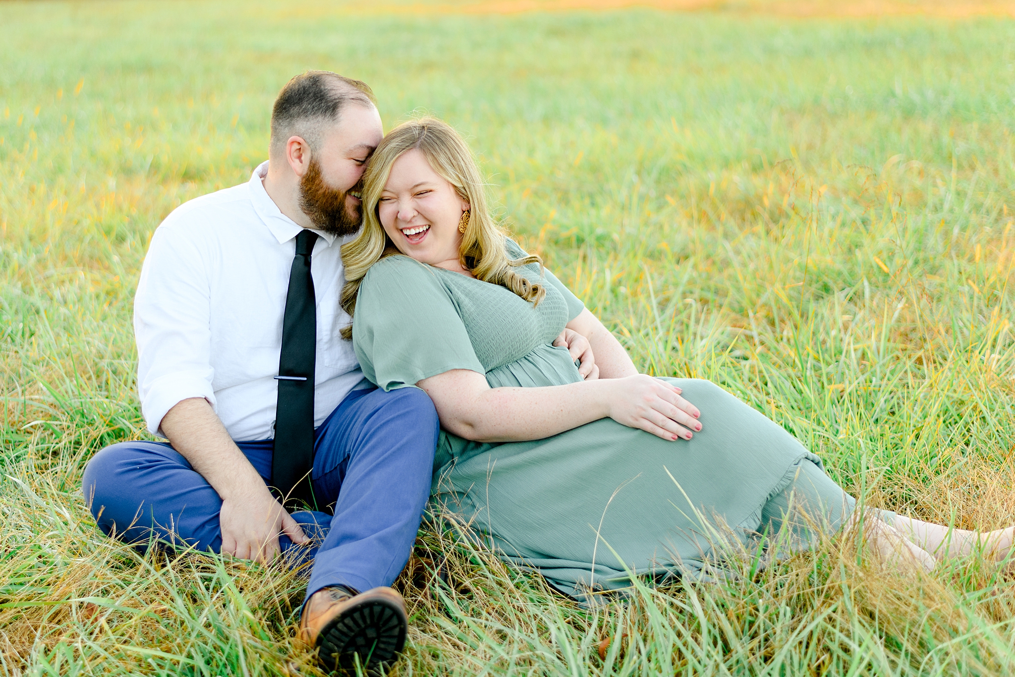 couple laughing during fall engagement pictures