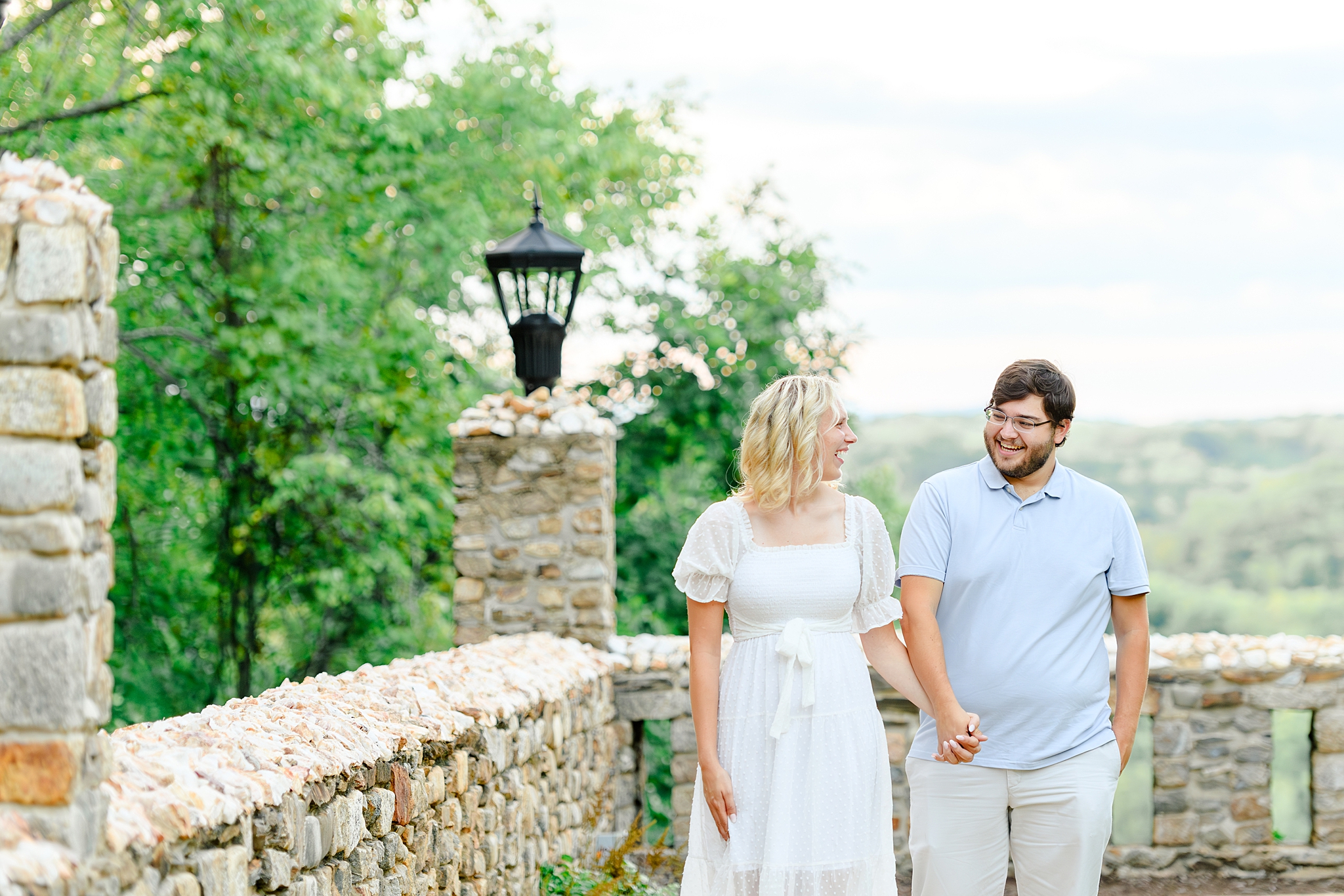 sweethearts taking engagement photos together