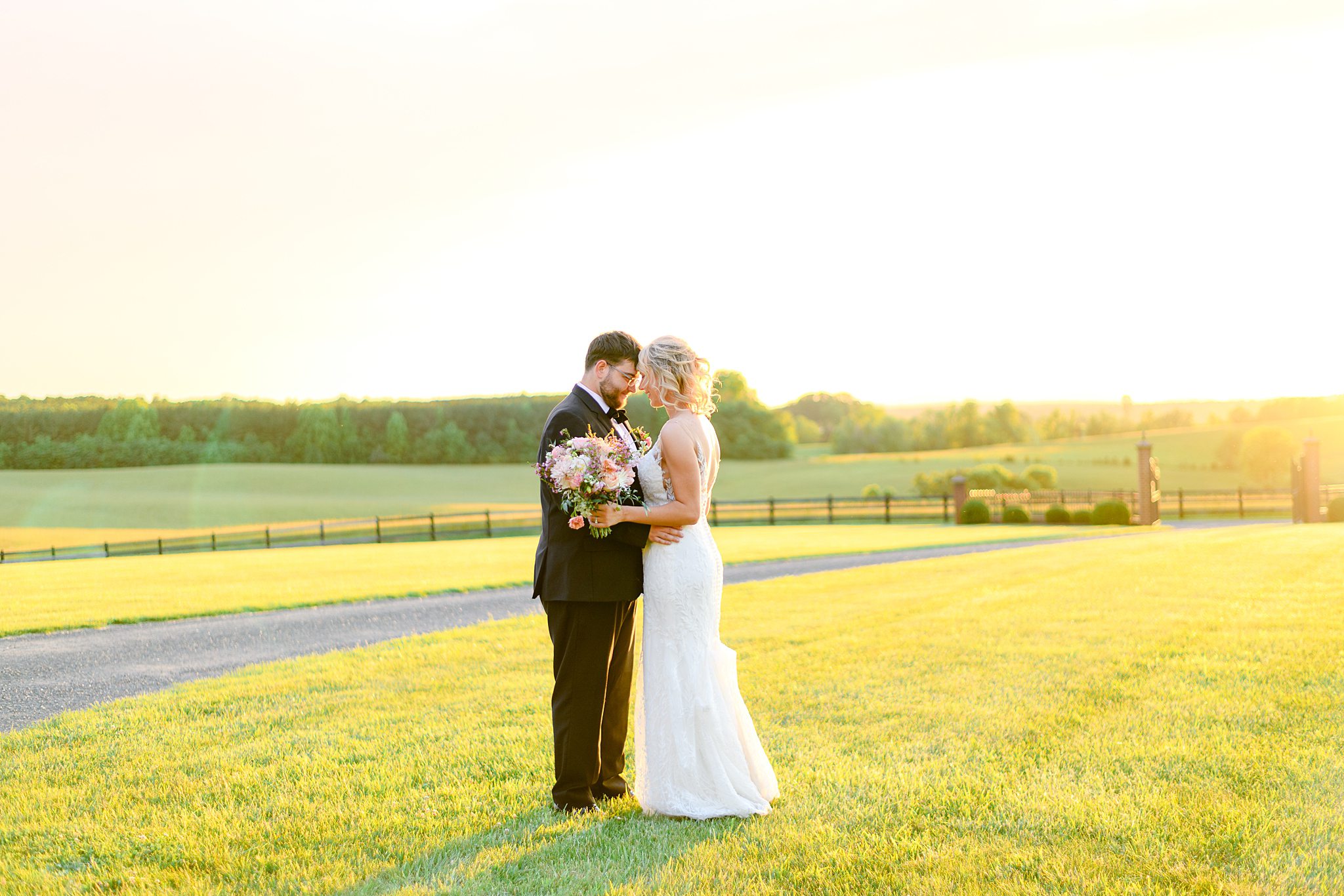 Bride and groom sharing a quiet moment during sunset at their Spring Grove wedding