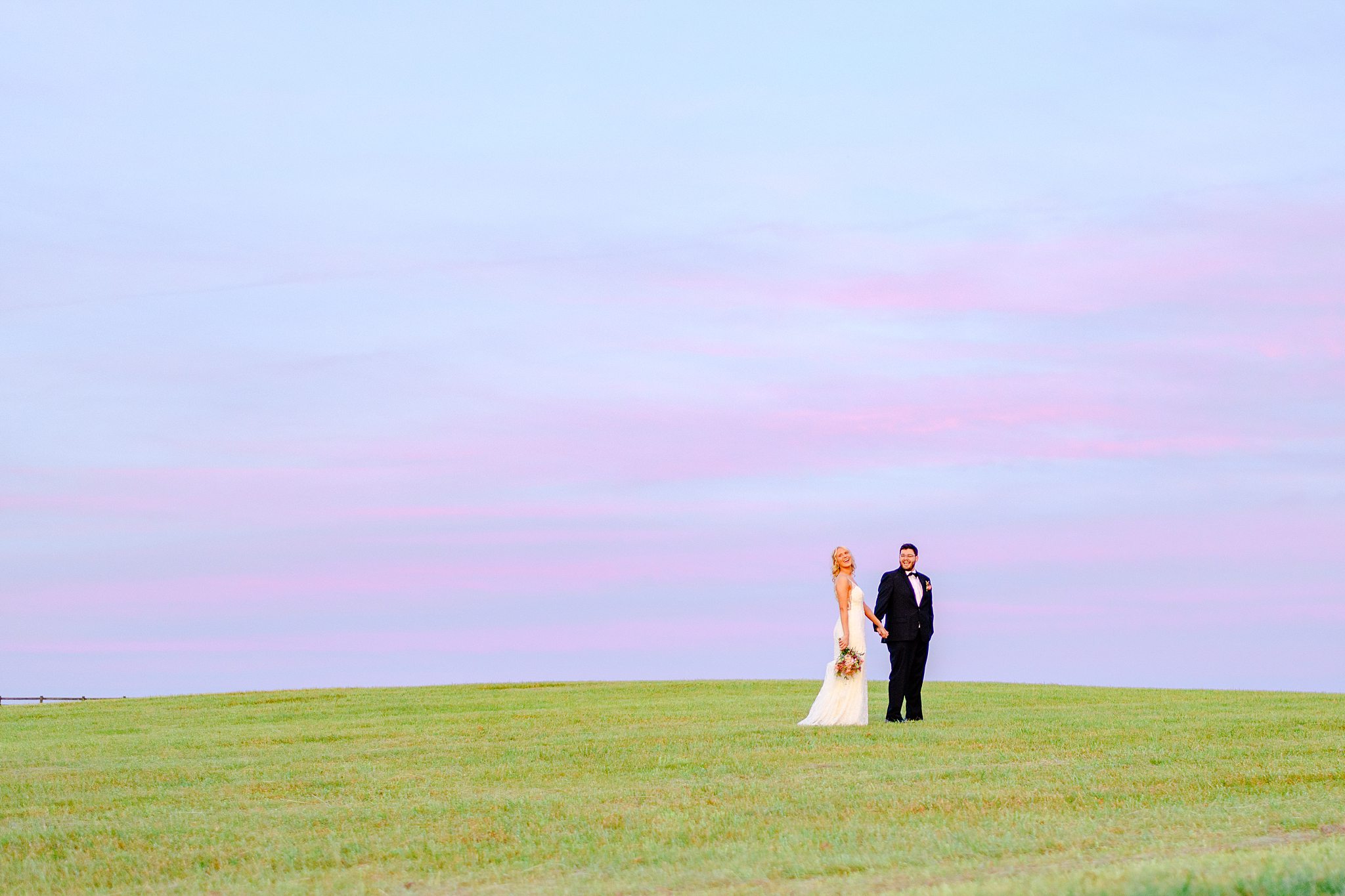 Romantic silhouette of the couple against the Spring Grove wedding sunset