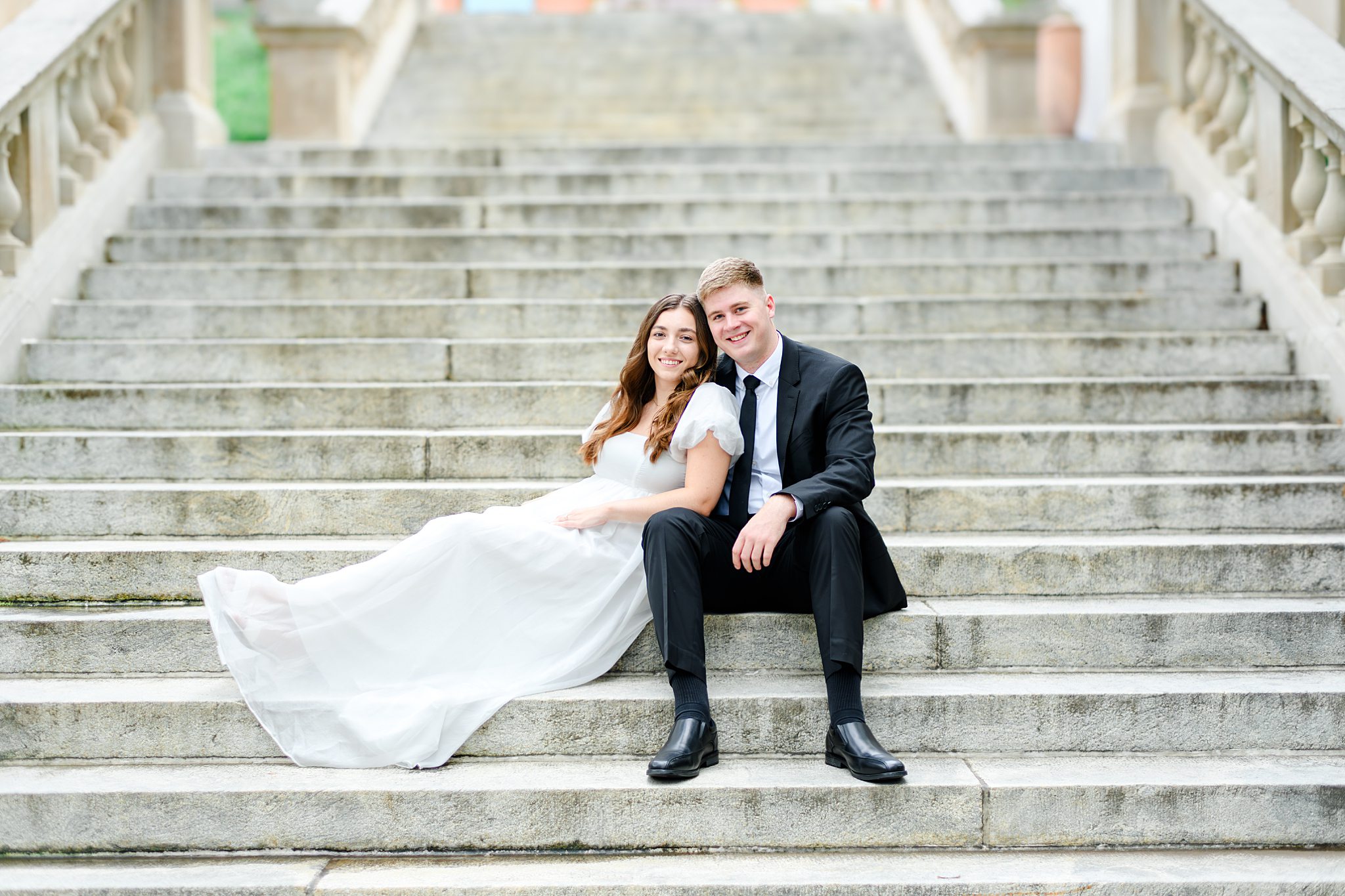 Virginia couple laughing during downtown Lynchburg engagement shoot