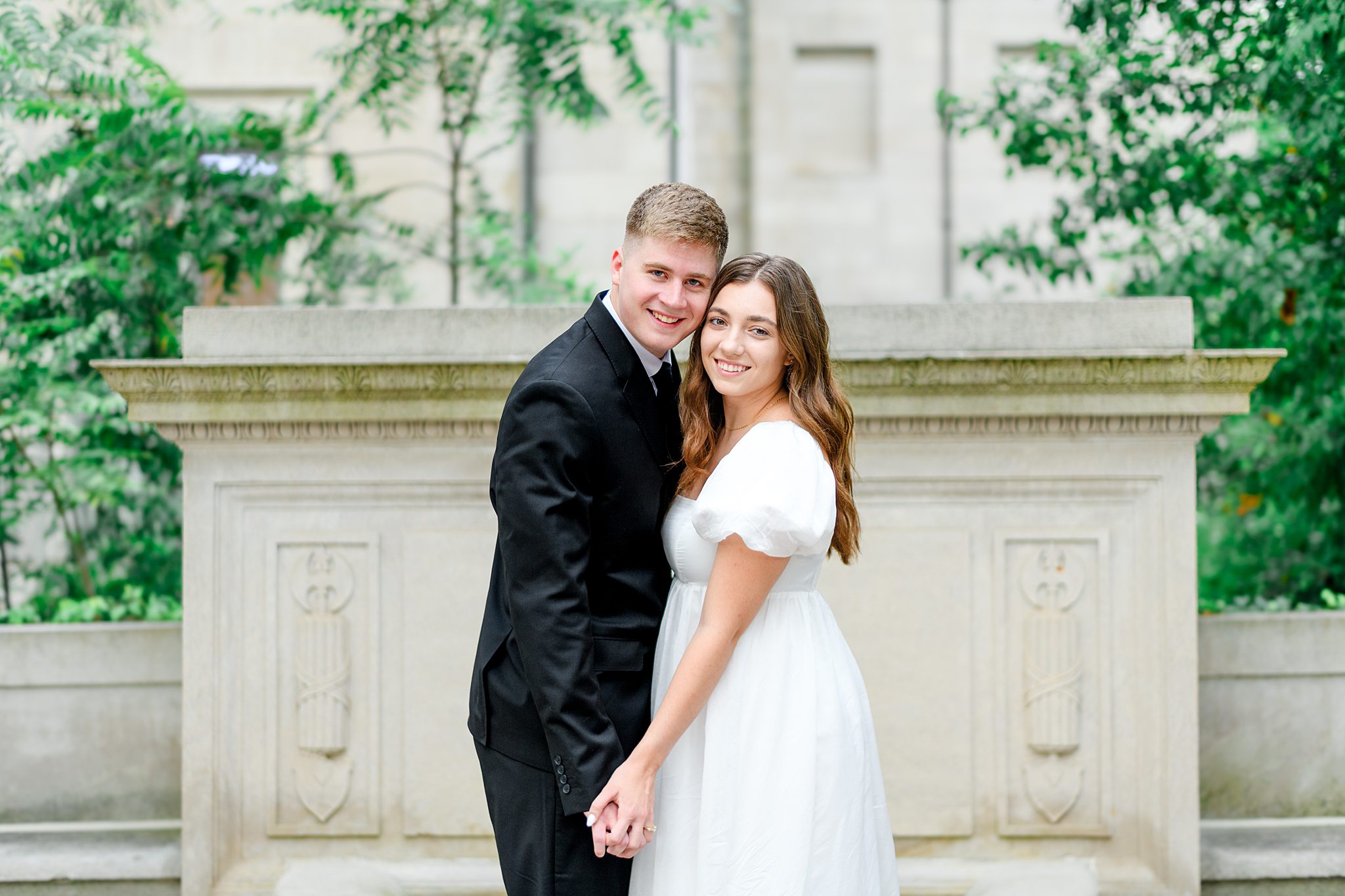 Groom-to-be smiling at fiancée during Virginia engagement session