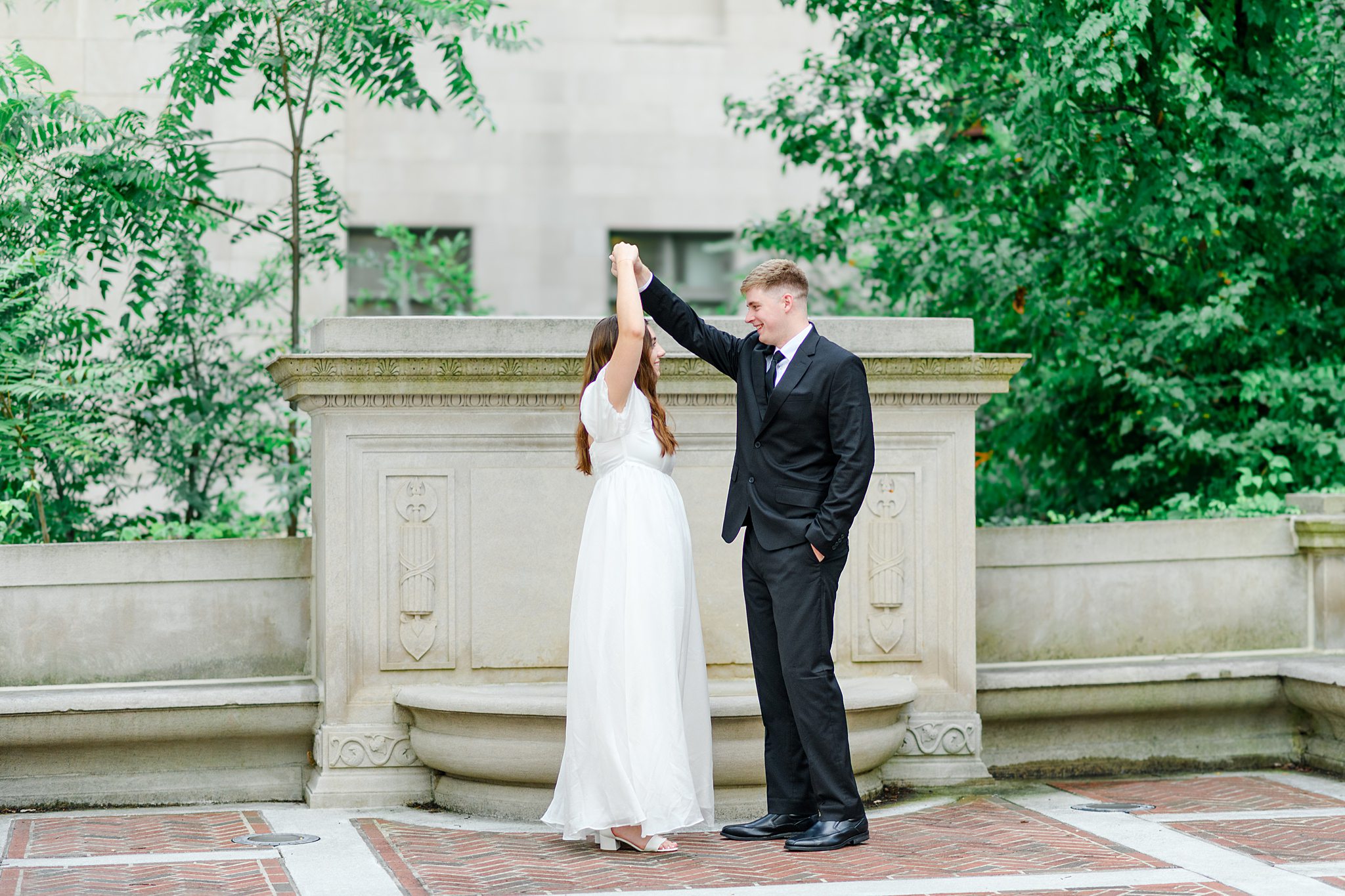 Bride twirling in front of Virginia engagement photo location