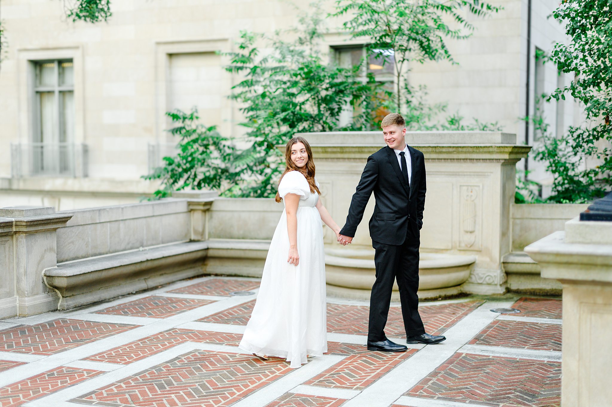 Engaged couple walking in Lynchburg, VA