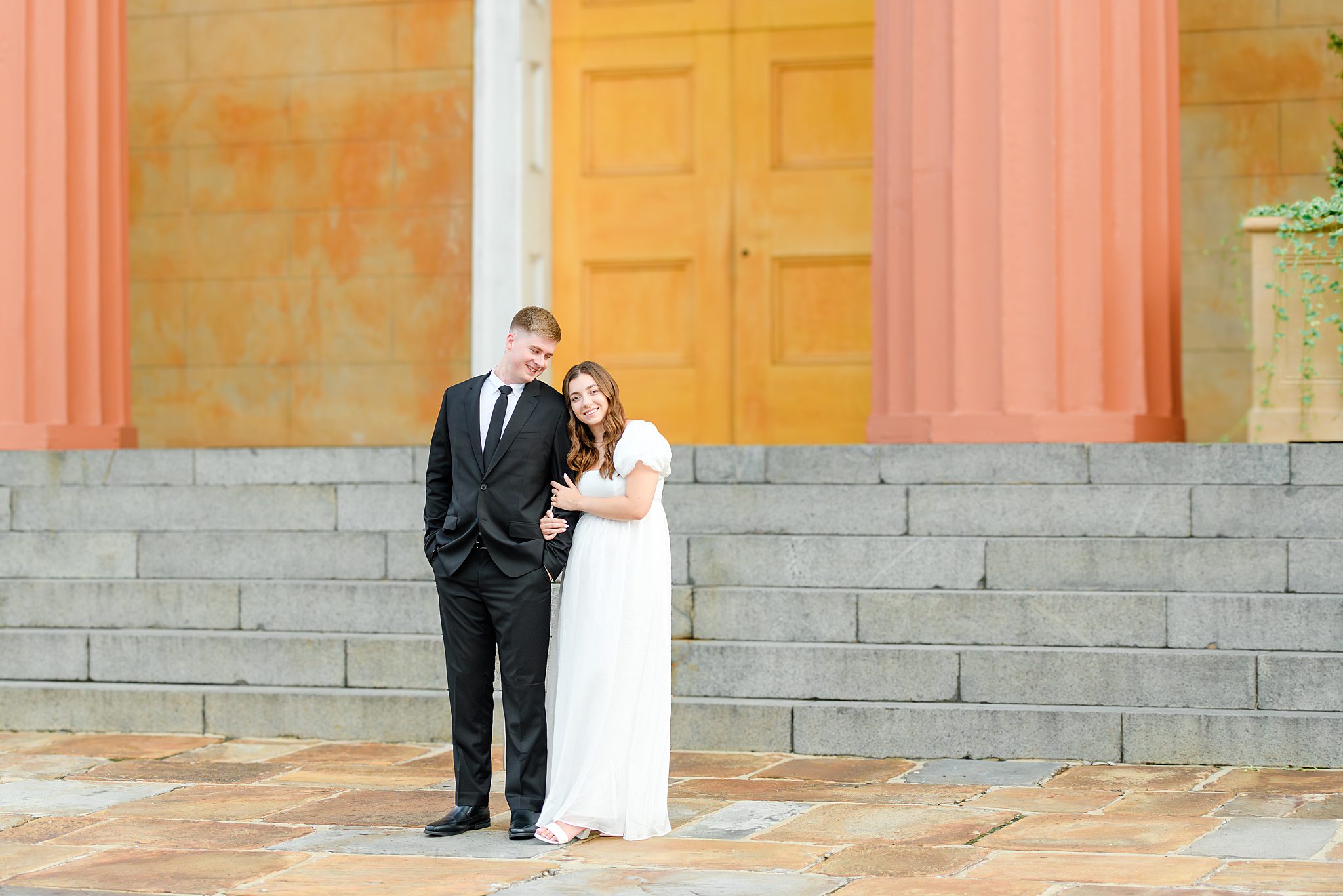 Groom looking at bride and smiling