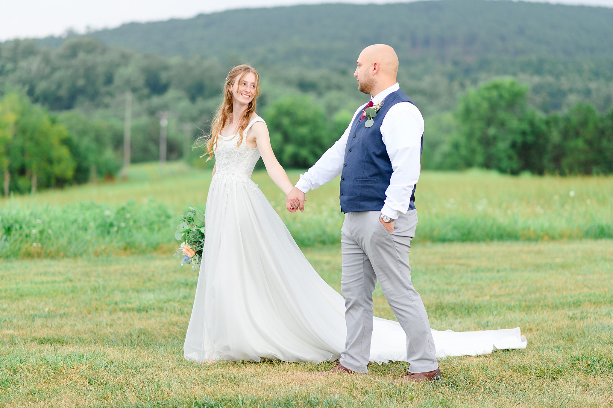 Candid bride and groom walking at Sorella Farms