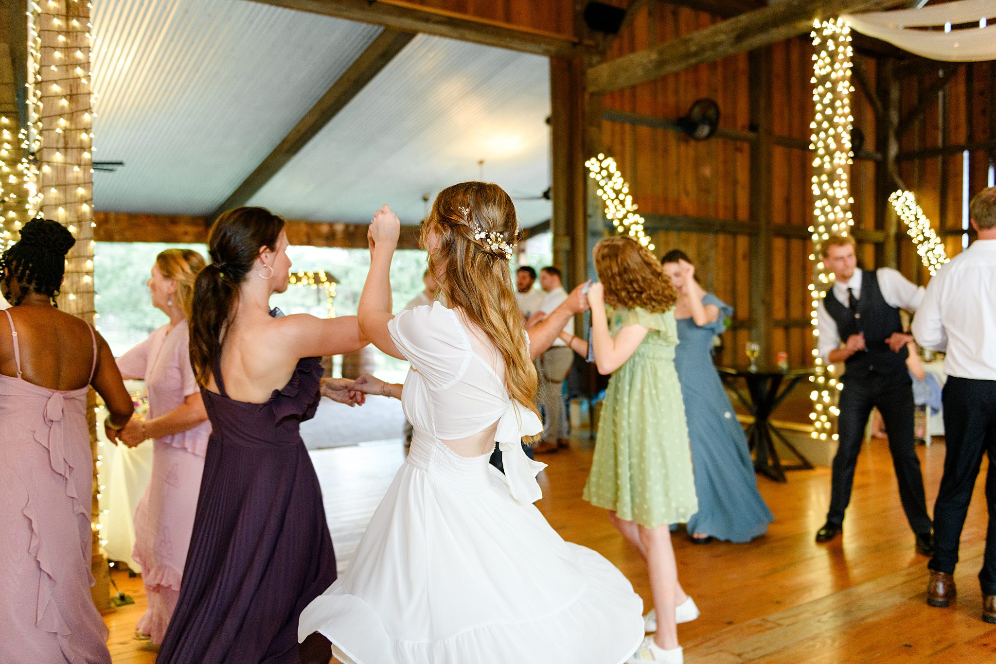 bride and mom dancing during wedding reception