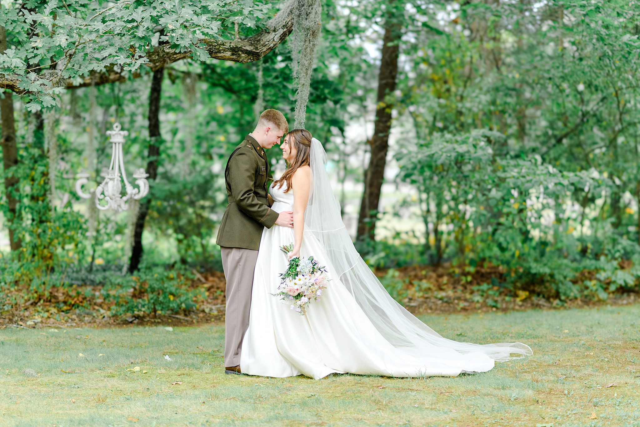 Couple taking newlywed photos at Glencliff Manor