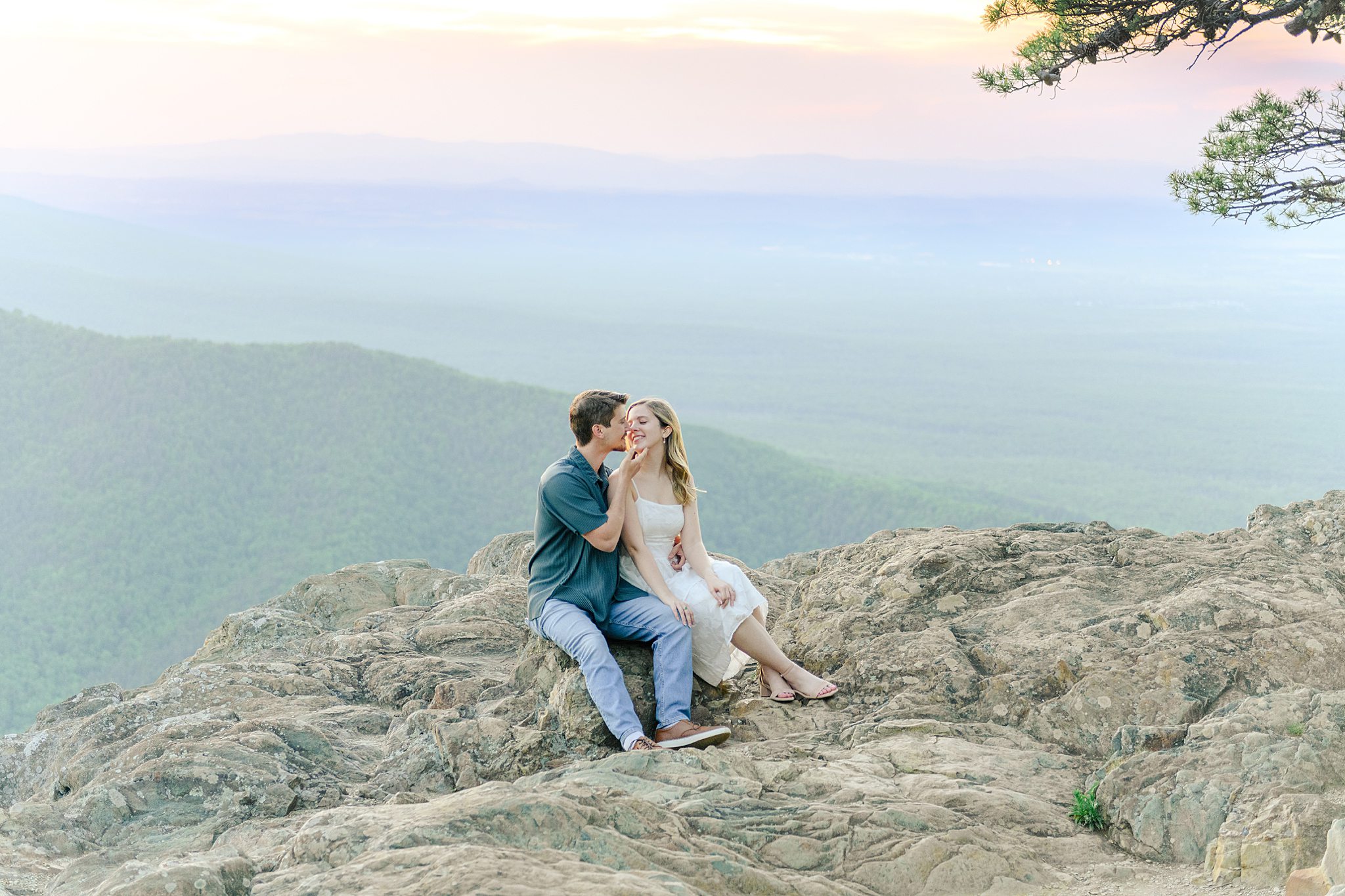 Mountain engagement session at Ravens Roost with engaged couple overlooking the Blue Ridge Parkway