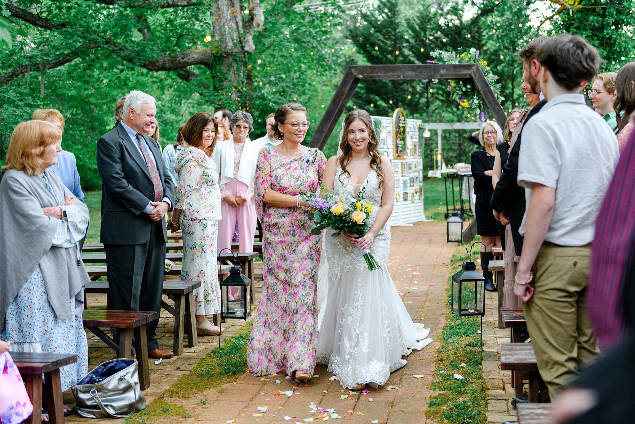 mom walking bride down the aisle