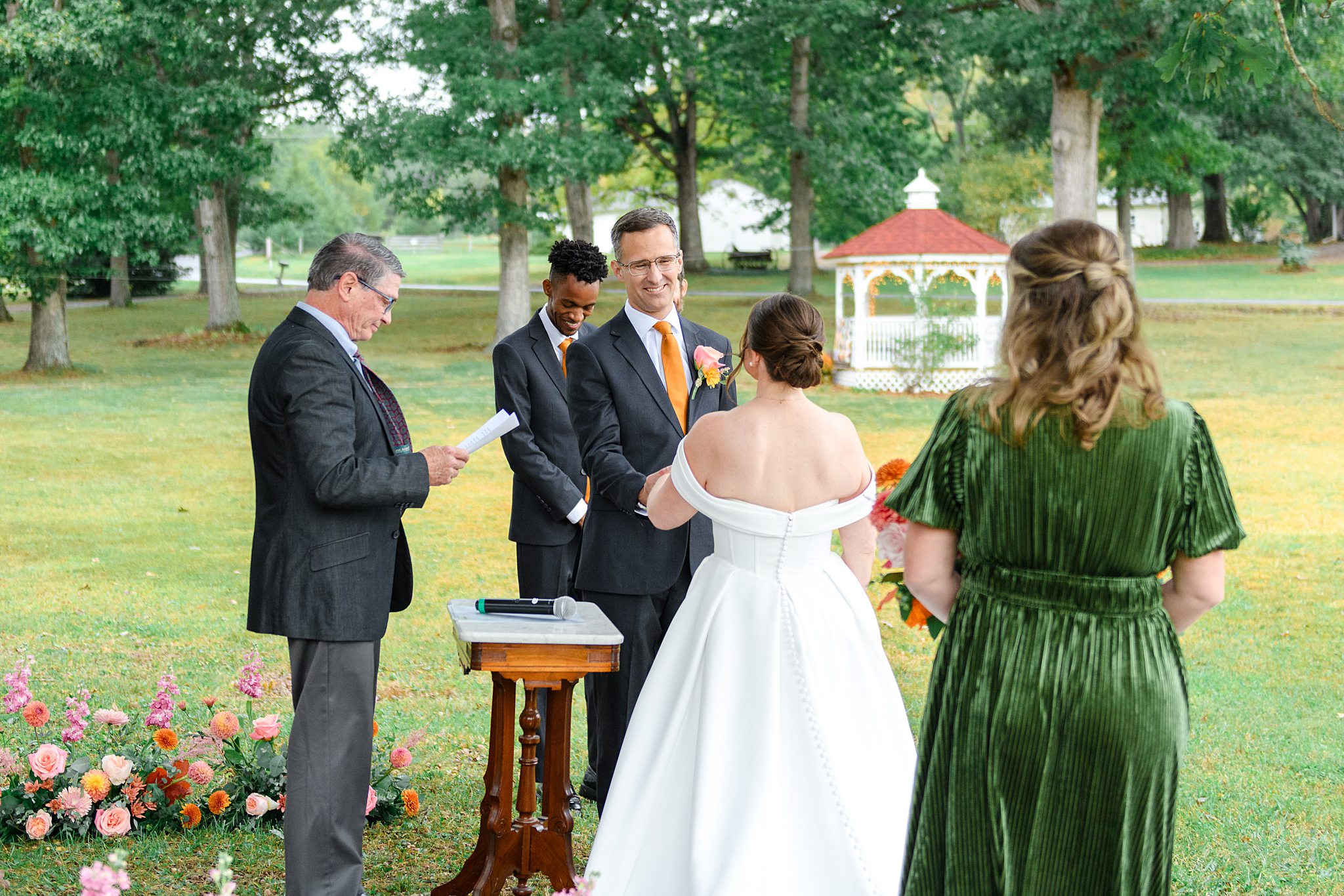 groom smiling during wedding ceremony